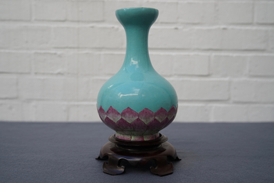 A Chinese famille rose turquoise ground lotus flower-shaped vase, 19/20th C.